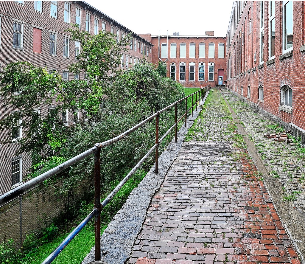 Courtyard space and walkways made of brick grace the outside areas of Pepperell Center in Biddeford.