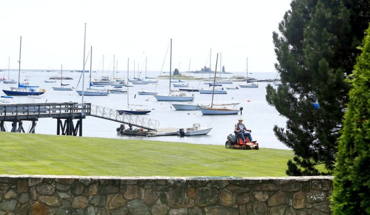 Owners of waterfront property, like this one in Kittery Point, are advised by environmental specialists not to fertilize much, if at all, and to avoid using weed killers and insecticides, which damage the waterway and the life in it.