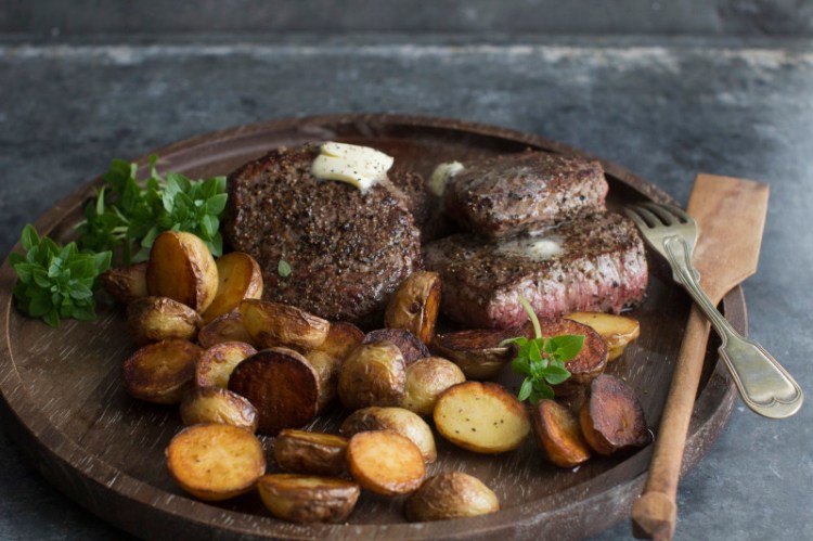 Buttered black pepper bison steaks