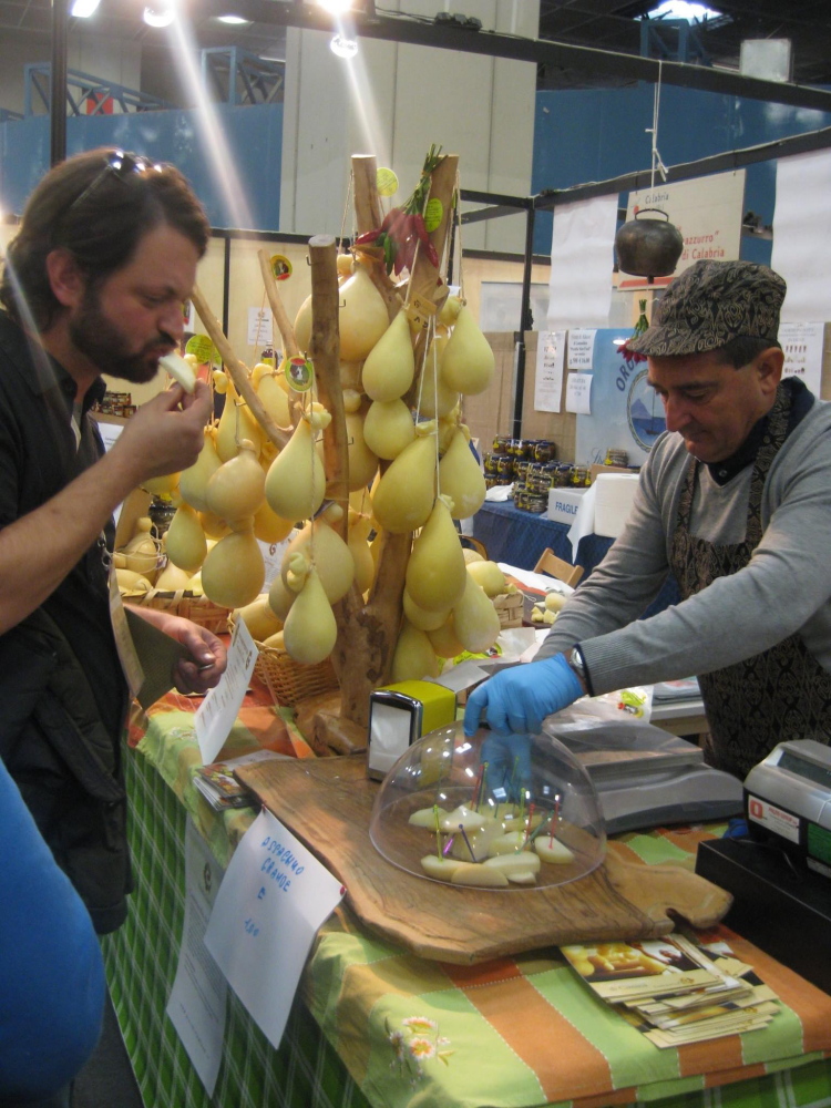 Shawn Saindon of Portland, a seafood wholesaler and apprentice cheesemaker, samples cheeses of the Piedmont region of northern Italy.