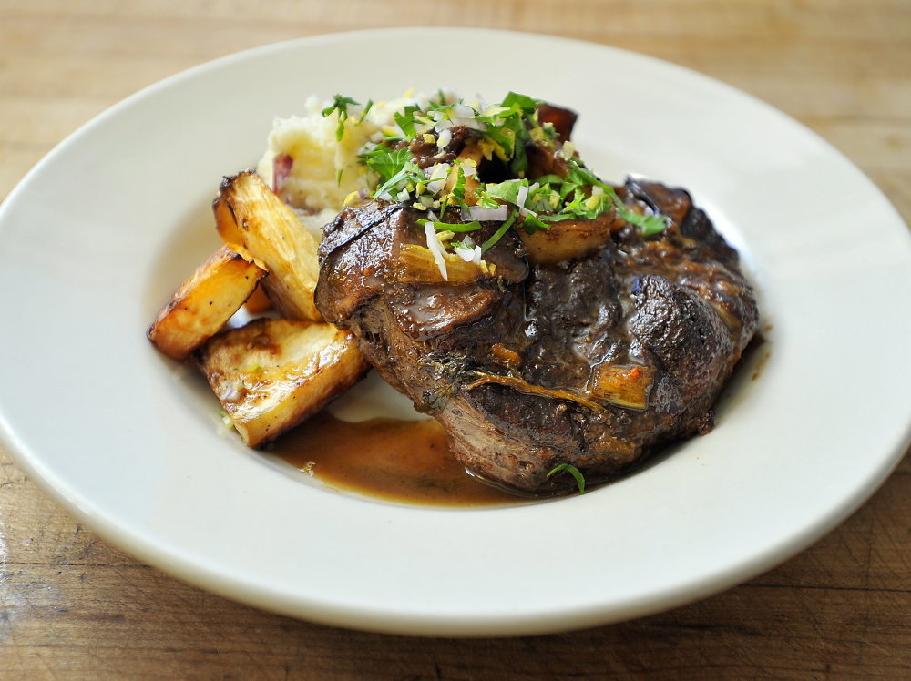 CAPE ELIZABETH, ME: NOVEMBER 13: Beef Osso Bucco, a special of the night at The Good Table in Cape Elizabeth, is made from red wine braised beef osso bucco, served with roasted local turnip and mashed local red potatoes topped with gremolata for Dine Out Maine. (Photo by Gordon Chibroski/Staff Photographer)