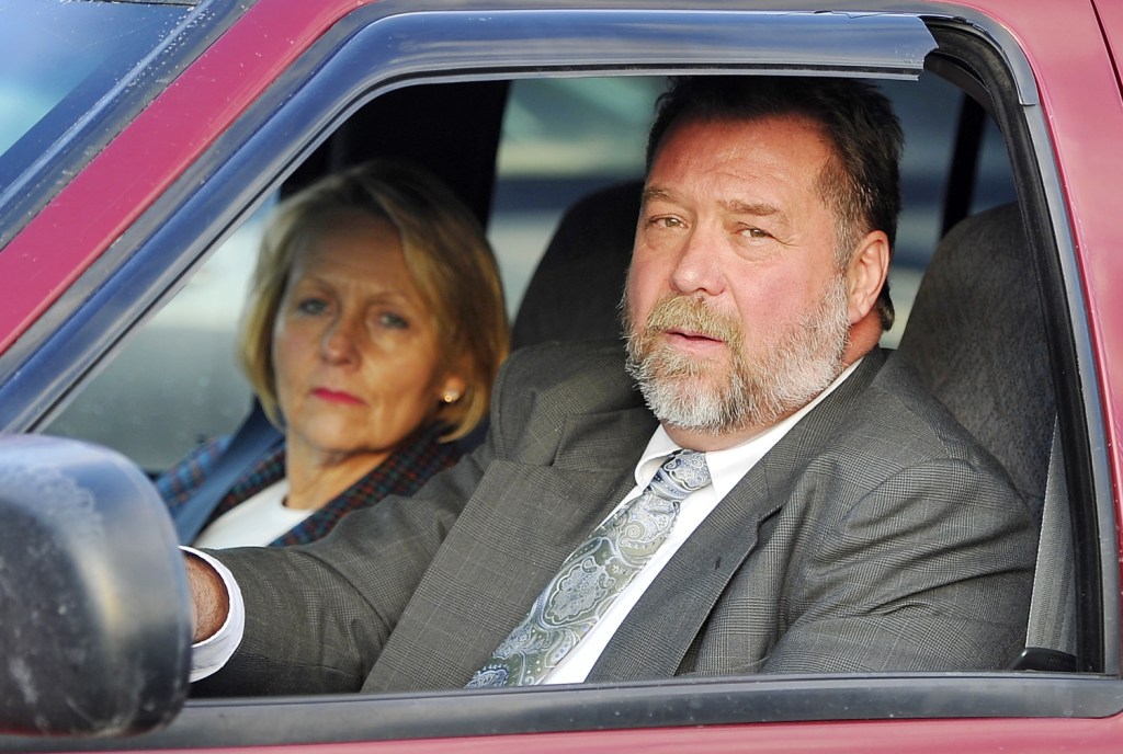 Ronald Petersen, who is on trial on charges of fraudulently billing MaineCare for as much as $400,000, leaves the parking lot of the York County Courthouse on Thursday with his wife.