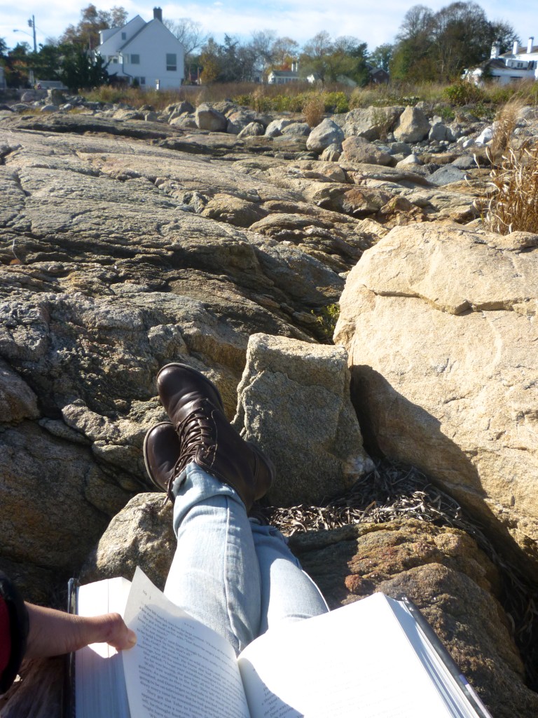 Sally takes time out to enjoy a book on the beach in Stonington. Sally Gardiner-Smith photo