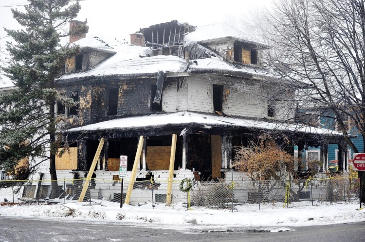 The heavily damaged building remains at 20 Noyes St. in Portland. Sworn statements from a former tenant and two fire survivors indicate there were no smoke detectors in one side of the duplex and a bookcase blocked a back stairway, forcing tenants to jump from a second-story window.