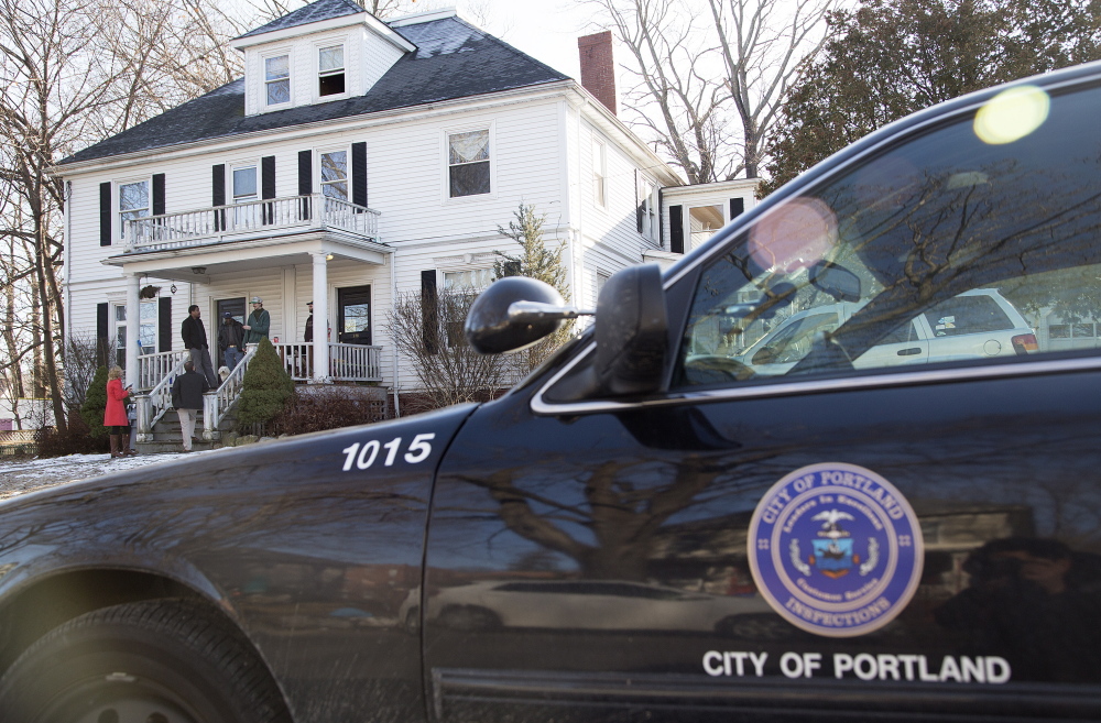 Fire safety violations were found in an inspection of 186-188 Dartmouth St. The landlord, Gregory Nisbet, won a court settlement Thursday allowing him to evict 10 tenants of the building.