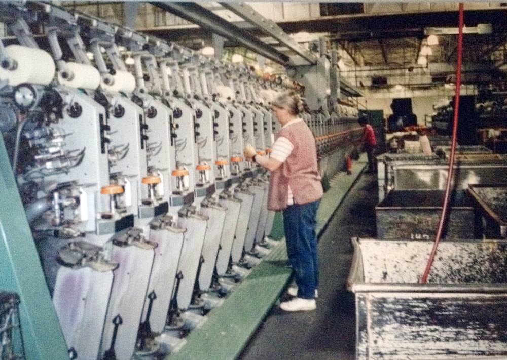 The spinning room in operation in the 1990s at the former Carleton Woolen Mill in Winthrop, which closed in 2002.