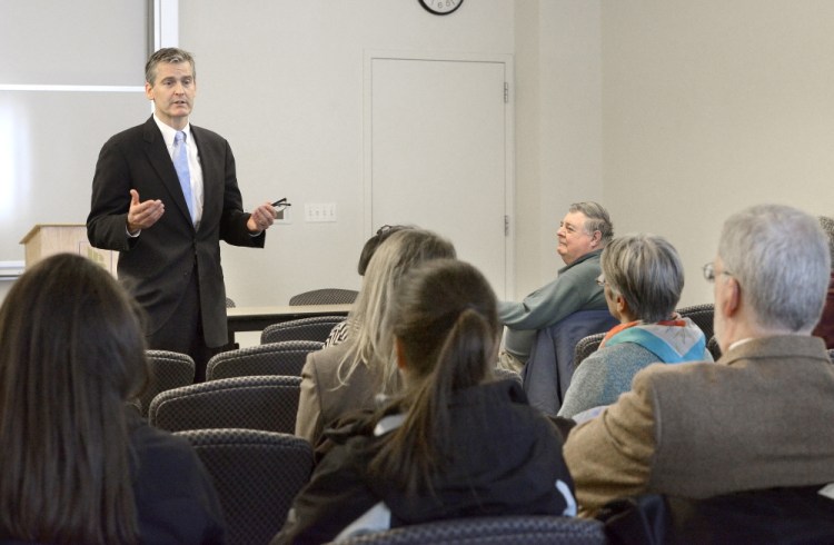 Glenn Cummings, one of three finalists for the job of president of the University of Southern Maine, speaks to a small gathering in the Abromson Community Center in Portland on Tuesday.