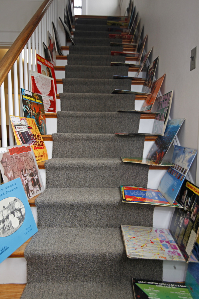 Record sleeves dry on stairs in a nearby building after a water pipe burst in WMPG’s studios at USM Wednesday night, soaking blues and other records, many “irreplaceable.” Up to 20 percent of the station’s vinyl library was damaged.