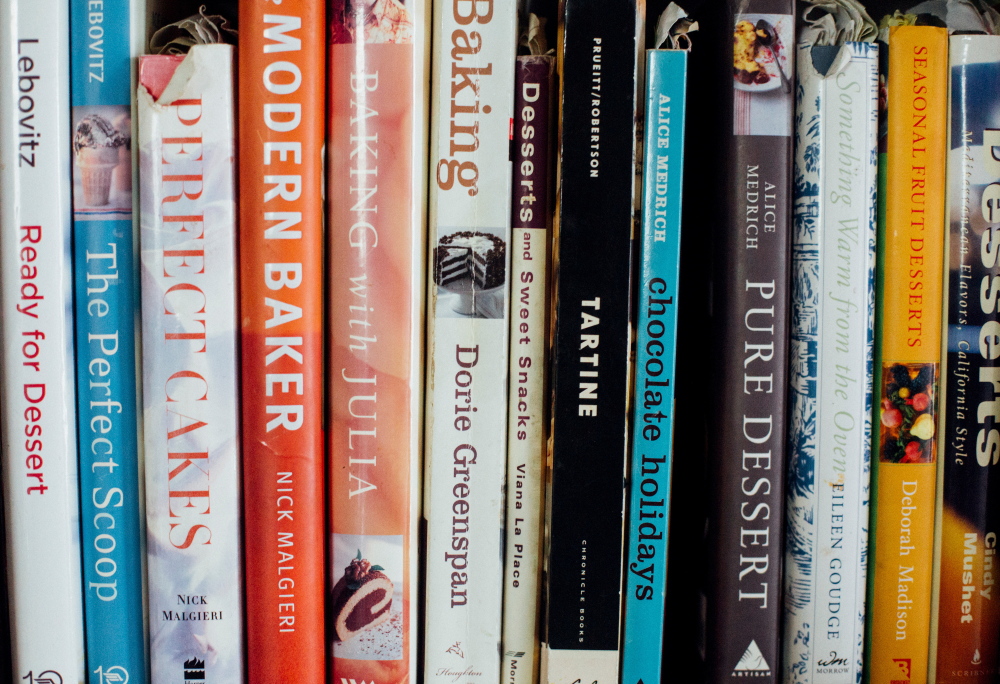 Baking cookbooks on Peggy Grodinsky’s shelf.