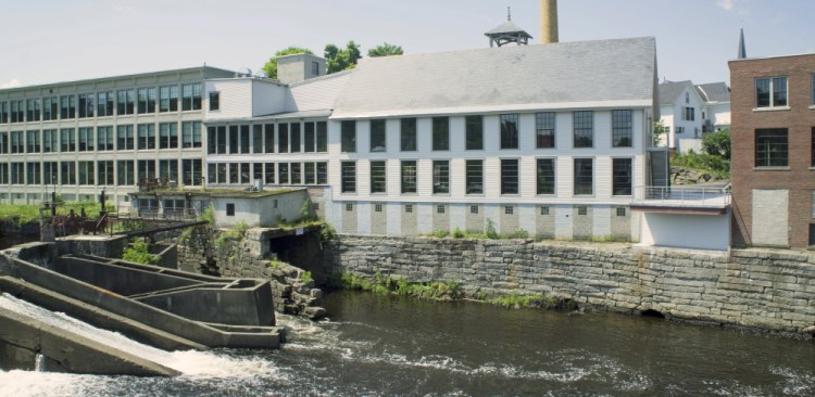 The mill buildings once housed a furniture manufacturer, but now hold more than 20 apartments, several small offices, a restaurant and an inn. Much of the space has been leased as developers prepare for the grand opening Saturday.