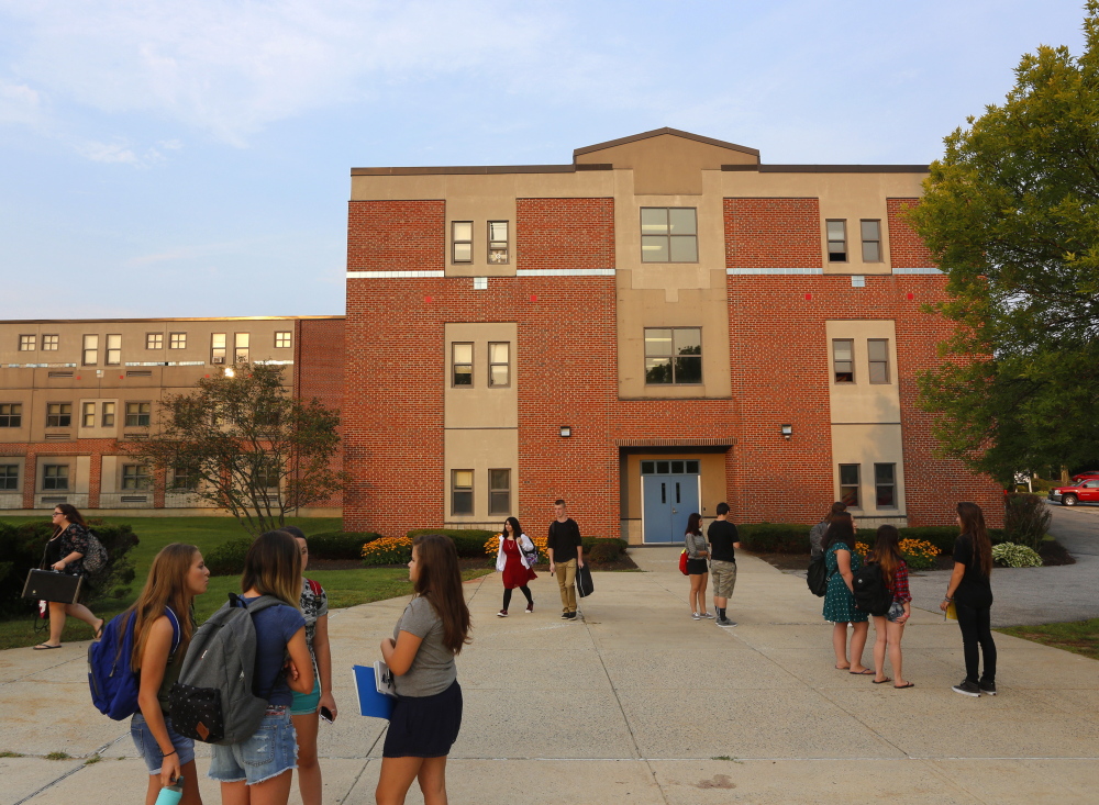 Students gather outside Westbrook High before the first bell. “Getting 30 minutes of extra sleep,” according to Dr. Thomas Mellow, a specialist at Maine Medical Center, “can be a big deal for a lot of kids.”