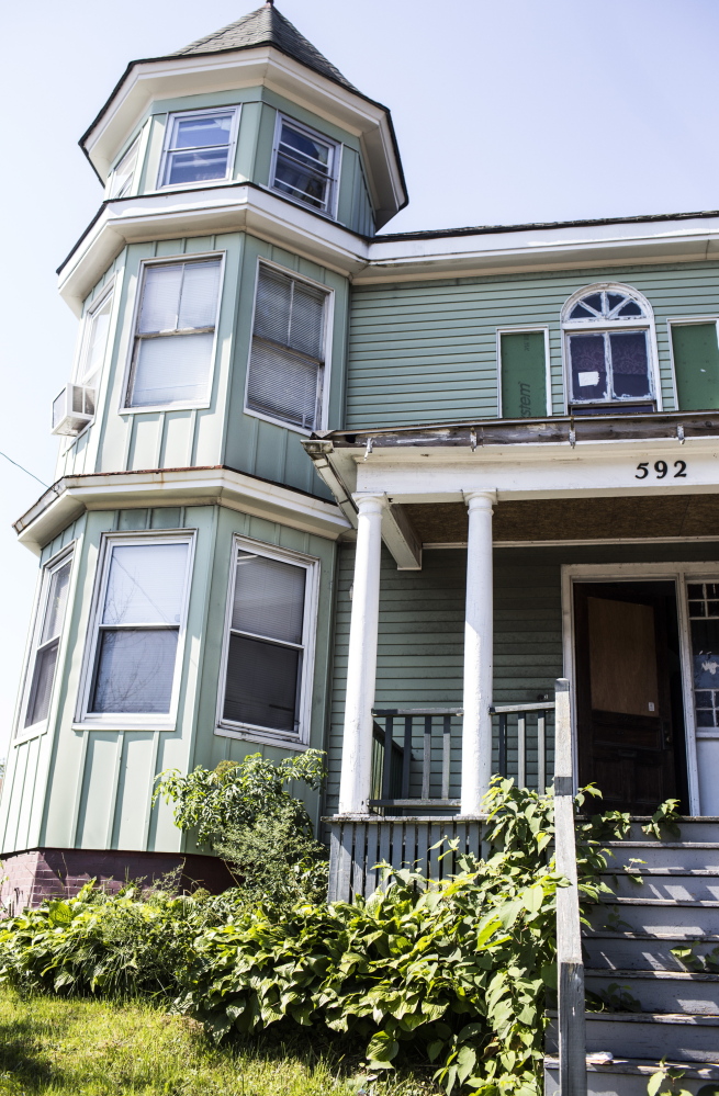 The threat of a court date prompted the landlord of this building at 592 Washington Ave. in Portland to fix safety violations, an associate corporation counsel to the city says.