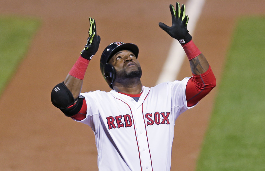 David Ortiz crosses home plate after the two-run home run in the first inning that put him over 100 RBI for the ninth season in his career.