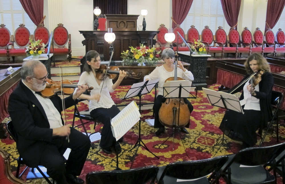 A string quartet performs during a memorial for former Vermont Lt. Gov. Barbara Snelling.