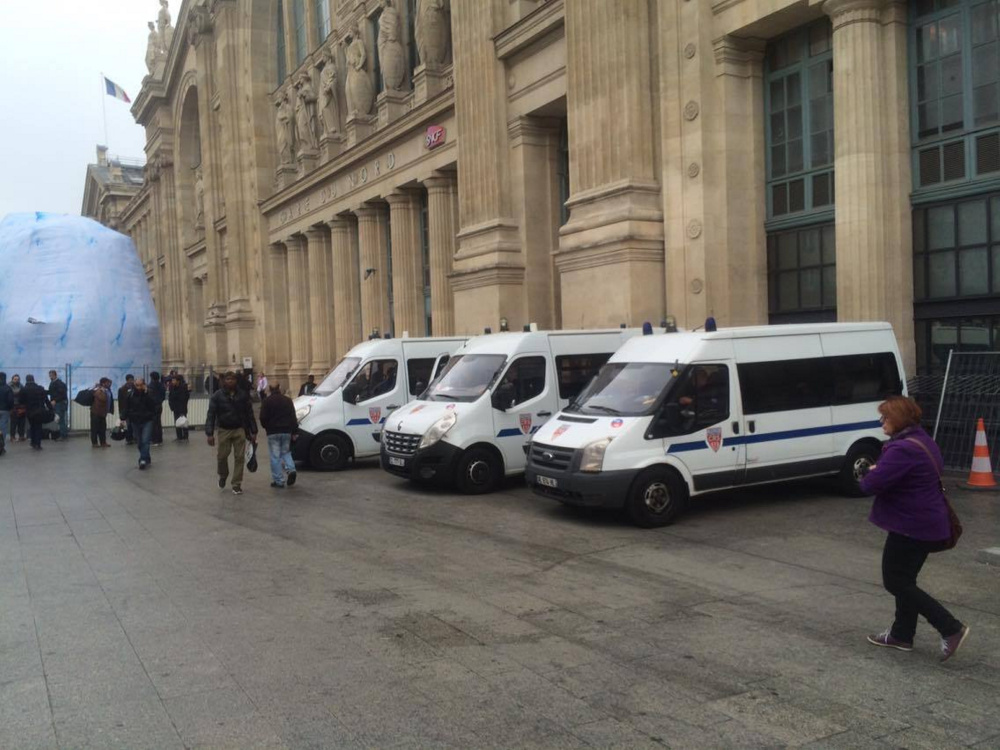 A few people walk outside the Gare du Nord station on Saturday in Paris.