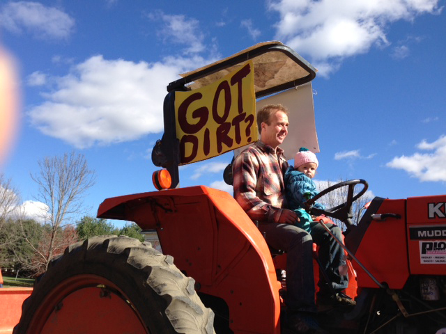 Vermont farmer Pete Johnson and future farmer Beatrice Johnson raising awareness about the nature of organic.; it's not just a matter of toxic chemicals. Barbara Damrosch photo