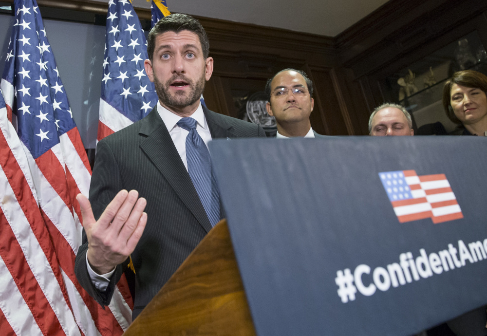 At a news conference following a closed-door GOP caucus meeting, Speaker of the House Paul Ryan, R-Wis., dismisses Republican presidential candidate Donald Trump's comments on Muslims, saying such views are "not what this party stands for and more importantly it's not what this country stands for," at the Republican National Headquarters on Capitol Hill in Washington, Tuesday, Dec. 8, 2015. Ryan is joined by, from left, Rep. Will Hurd, R-Texas, Majority Whip Steve Scalise, R-La., and Rep. Cathy McMorris Rodgers, R-Wash., chair of the Republican Conference.  (AP Photo/J. Scott Applewhite)