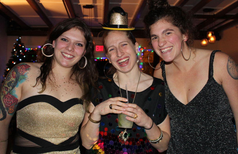 Melissa “Eva La Diva” Michaud, left, Marnie “Chickadee Wallop” Williamson and Leah “Cabbage Smash Kid” Farber.