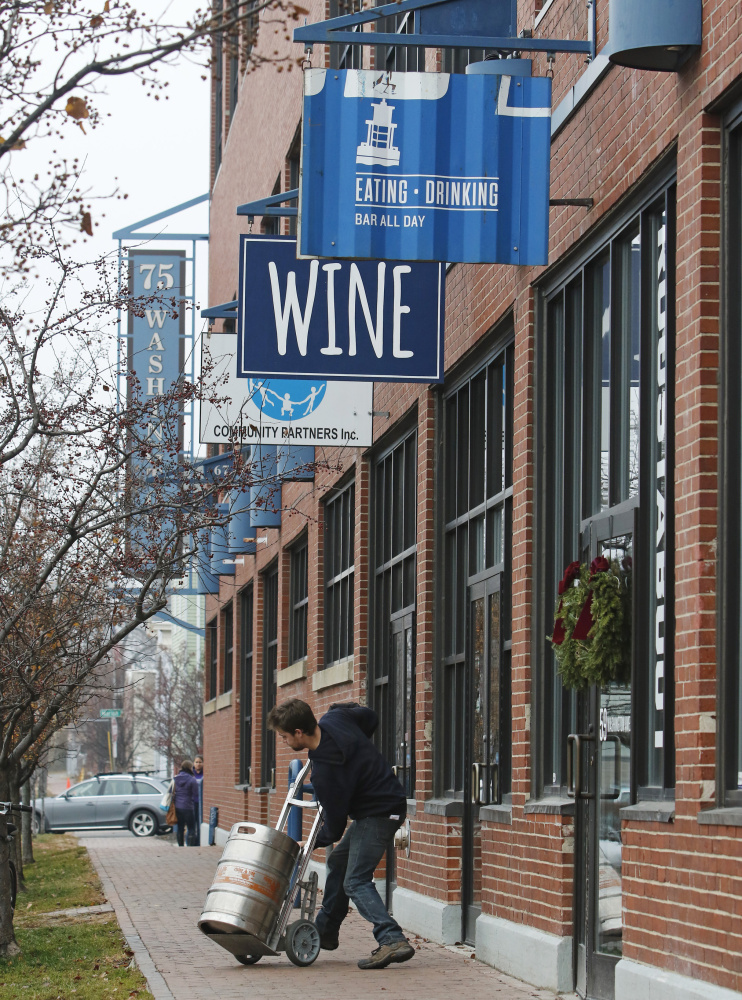 A delivery arrives at the Maine & Loire wine shop, which offers wine and tastings a short distance from the Roustabout and Terlingua restaurants along Washington Avenue.