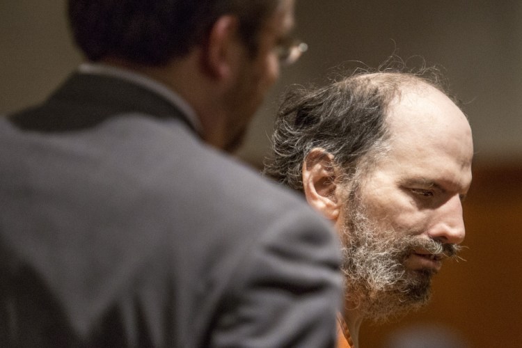 Christopher Porter, 49, of Brunswick, is arraigned at the Cumberland County Courthouse Thursday. He is charged with attempted murder and elevated aggravated assault after he allegedly hit his 91-year old father in the head repeatedly with a baseball bat. Representing Porter is attorney Robert Ruffner, at left.