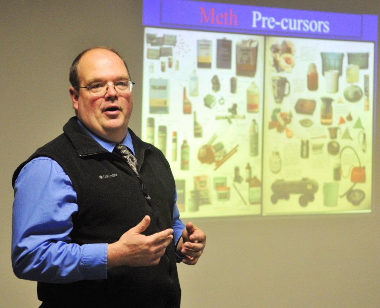 Winthrop Police Detective Peter Struck talks about the drug crisis during a Winthrop Lakes Chamber breakfast meeting on Thursday.