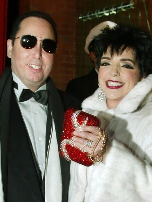 David Gest and Liza Minnelli share a moment in Hamburg, Germany in 2002, when they were husband and wife. Gest, who was a"show biz icon" and a friend of Michael Jackson died at age 62 Tuesday.