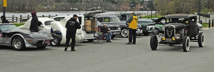 A hot rod leaves the parking lot on during the first Classic Cruise-In Night on Thursday at Gardiner Waterfront Park.