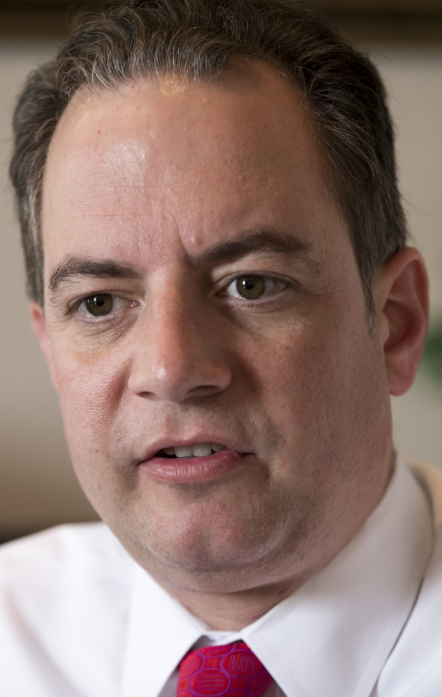 Republican National Committee (RNC) Chairman Reince Priebus answers questions from The Associated Press about Thursday's face-to-face meeting between Donald Trump, the GOP's presumptive presidential nominee, and House Speaker Paul Ryan of Wis., Friday, May 13, 2016, at RNC headquarters on Capitol Hill in Washington. With the GOP both energized and torn over Trump's rise, Trump and Ryan pledged to work together despite their differences, though the speaker stopped short of a full-throated endorsement. (AP Photo/J. Scott Applewhite)