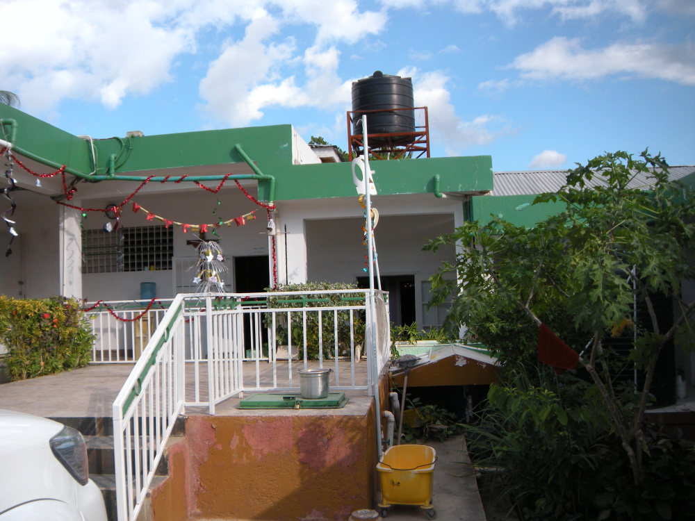 Photo courtesy of Jeanne Otis
St. Patrick Youth Center has no access to power lines or running water; electricity is provided by a solar array, and rainwater is collected and stored in a tank on the roof, from which it flows to the kitchen and bathrooms.