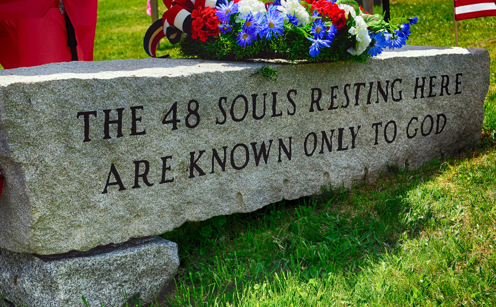 A new marker is dedicated during a ceremony Saturday at Riverside Cemetery in Pittston.