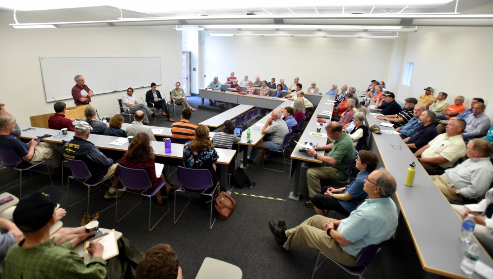 The Pugh Room in the Diamond Building fills to capacity Thursday for The Future of Solar in Maine Forum at Colby College in Waterville.