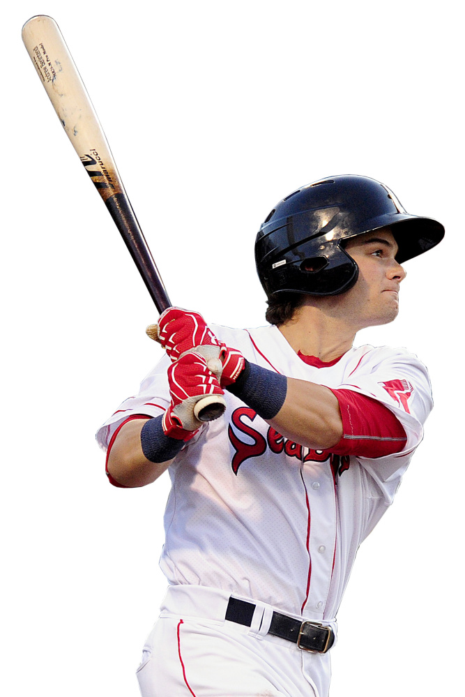 Andrew Benintendi of the Portland Sea Dogs watches his fourth inning double take flight in a game against the Richmond Flying Squirrels on June 10.