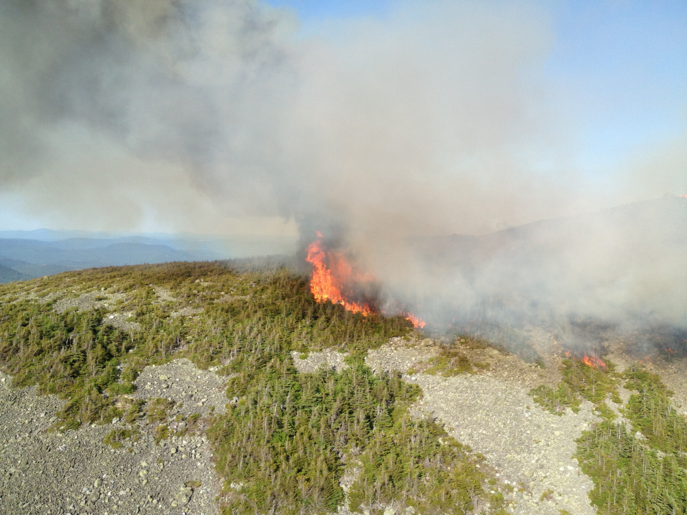 A fire on Mount Abraham near Kingfield started after a lightning strike Wednesday, rangers say. 
Courtesy Maine Forest Service