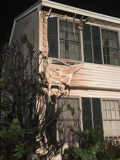 Fireworks caused a fire that melted the siding on this home in Cumberland's Crossing Brook neighborhood. 