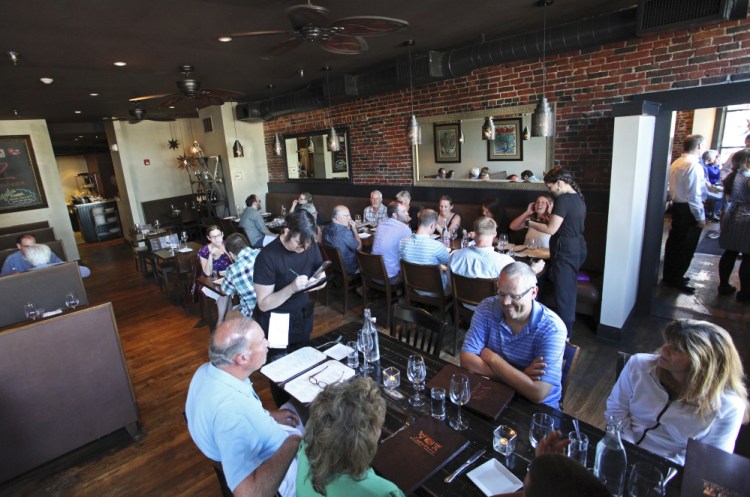 Diners place their orders during a busy dinner hour at Zapoteca. 