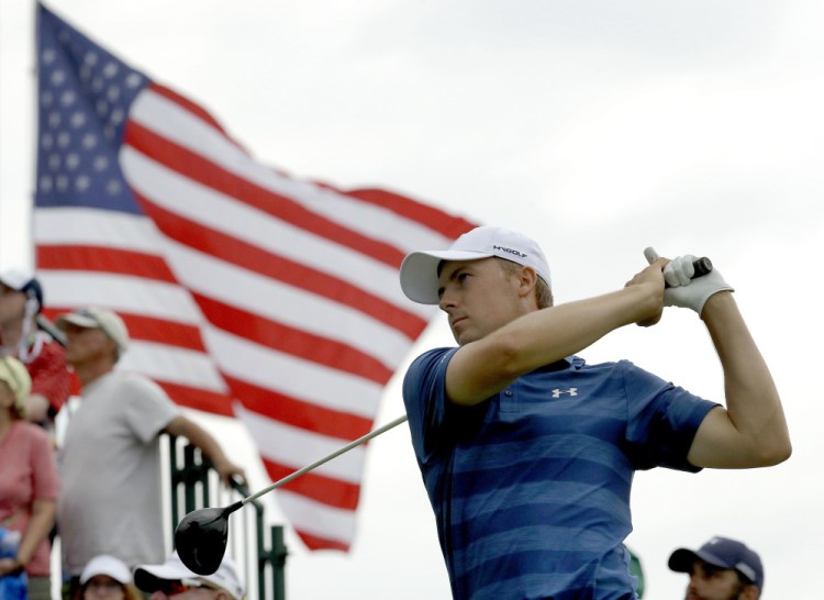 Jordan Spieth watches his tee shot on the third hole during the first round of the U.S. Open golf championship at Oakmont Country Club in Oakmont, Pa. Spieth is out of the Olympics. He will be replaced by Matt Kuchar.