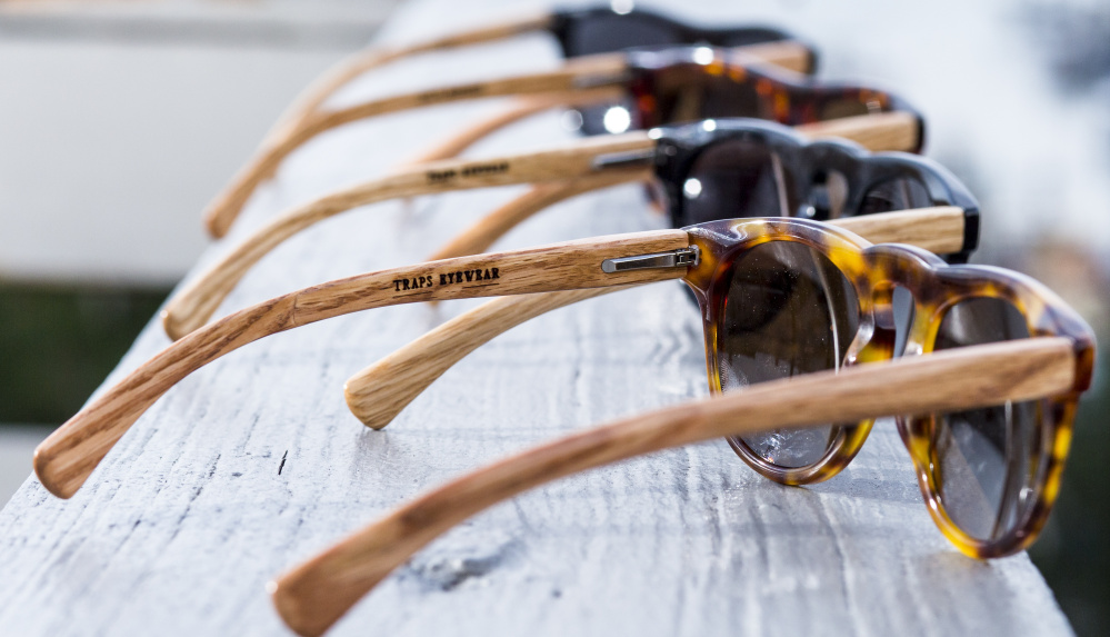 Traps Eyewear shades, priced at $240-$285, have salvaged lobster trap wood for temples. They're available at Rough & Tumble in Portland and Day Trip Society in Kennebunkport. Ben McCanna/Staff Photographer