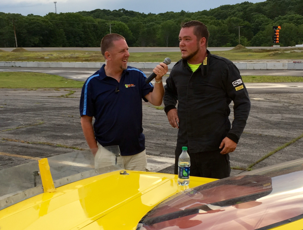  Josh St. Clair of Liberty, right, talks to Wiscasset Speedway track announcer Ken Minott after winning the Late Model feature Saturday night.
Travis Barrett photo 