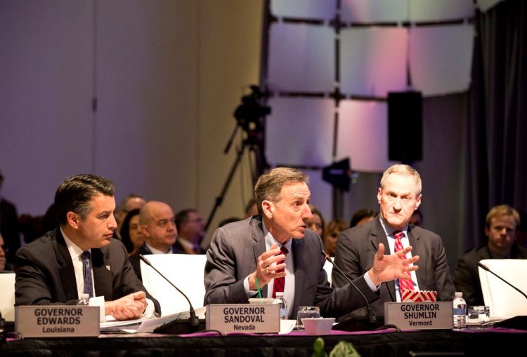 Nevada Gov. Brian Sandoval and South Dakota Gov. Dennis Daugaard listen to Vermont Gov. Peter Shumlin’s remarks during a National Governors Association session on "Strengthening Partnerships to Address the Nation’s Opioid Crisis" at the group's winter meeting on Feb. 20. 