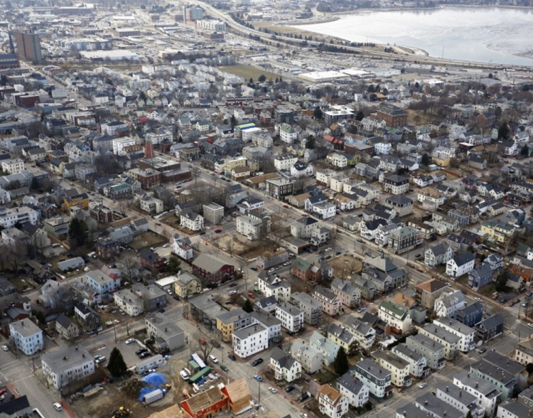 Portland, with Munjoy Hill in the foreground, is among the cities nationwide trying to develop a policy on short-term rentals to deal with complaints from hotels and housing advocates.