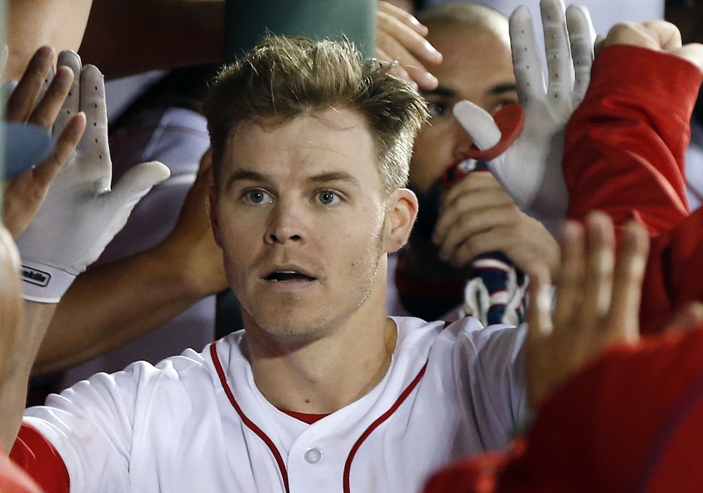 Boston's Brock Holt celebrates his two-run homer during the sixth inning of Saturday's 6-3 win over the Arizona Diamondbacks in Boston.