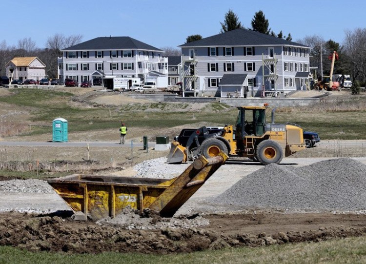 Apartments under construction at Blue Spruce Farm in Westbrook in April. <em>Derek Davis/Staff Photographer</em>