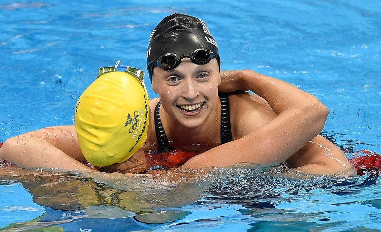 U.S. gold medal winner Katie Ledecky is congratulated by Sweden's silver medal winner Sarah Sjostrom after the women's 200-meter freestyle at the 2016 Summer Olympics on Tuesday in Rio de Janeiro, Brazil. 