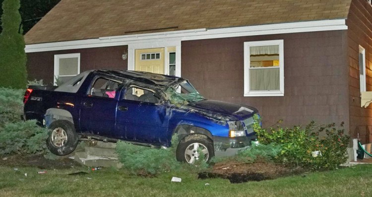 Shane McAlister is accused of crashing this SUV into a house in Yarmouth after a police chase on Aug. 26. He then fled.
<em>Contributed photo by Tom Bell</em>