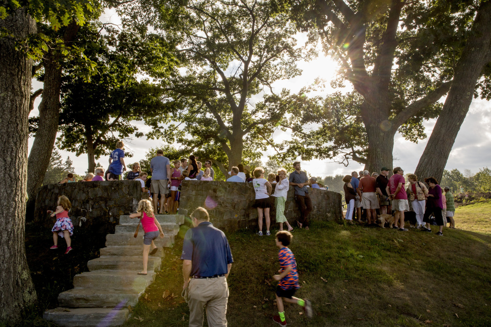 Celebrants gather around the Council Ring, a former bandstand built by the Civilian Conservation Corps, during the grand opening of the new Children's Garden at Fort Williams Park on Cape Elizabeth on Friday, Sept. 9, 2016.