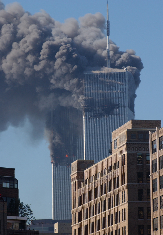 The South Tower of the World Trade Center's twin towers begins to collapse after a hijacked plane crashed into it on Sept. 11, 2001 in New York City. The attack changed the world forever.