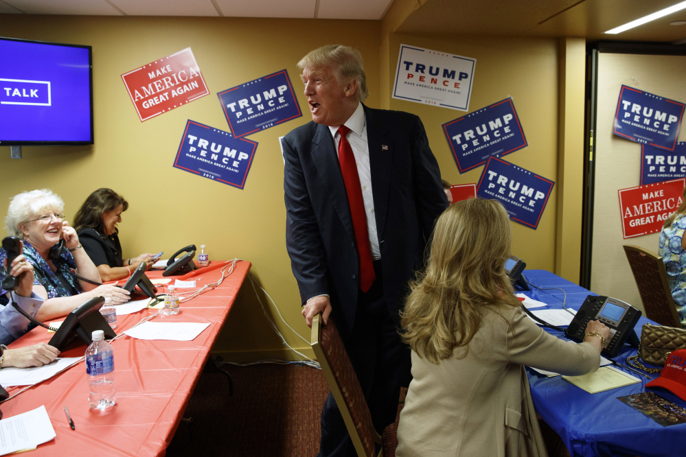 Republican presidential nominee Donald Trump visits a call center before the start of a rally Monday in Asheville, N.C. 