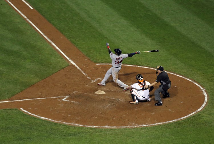 David Ortiz hits a three-run home run in the seventh inning Tuesday night to give the Red Sox a 5-1 lead and set an all-time record for home runs by a player in his final season.