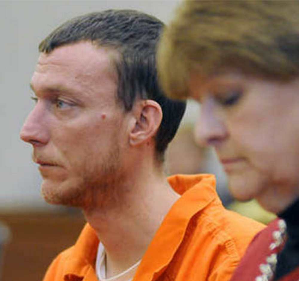 Mark Halle of Waterville listens during his bail hearing with his attorney, Pamela Ames, in February at the Capital Judicial Center in Augusta.