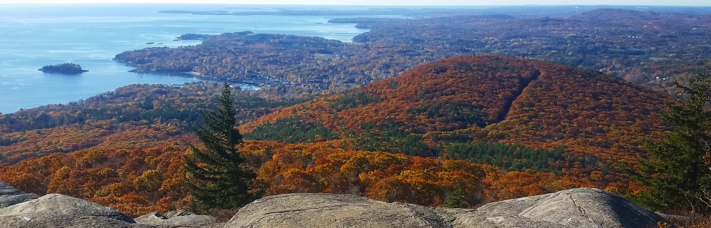 The view from Ocean Lookout on Mount Megunticook is quite spectacular, overlooking Camden, Rockport and Rockland to the south. Turn east to see Vinalhaven, North Haven and other islands, and turn west to see the Camden Snow Bowl.